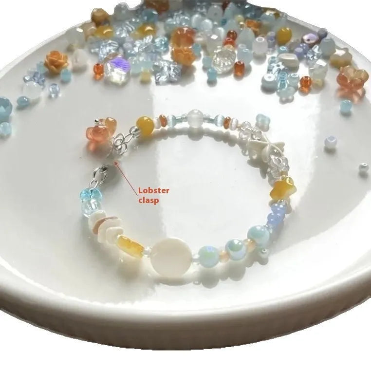 Orange sea theme adjustable alloy bracelet with diamond shape and round decorative elements