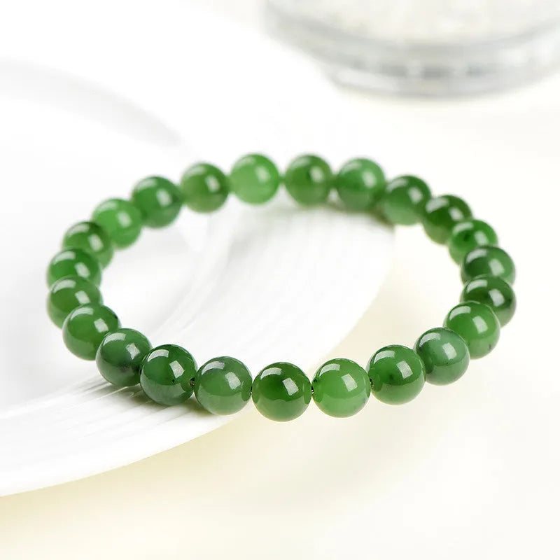 Natural Hetian jade beaded bracelet with polished jasper stones in five size options on a white background.