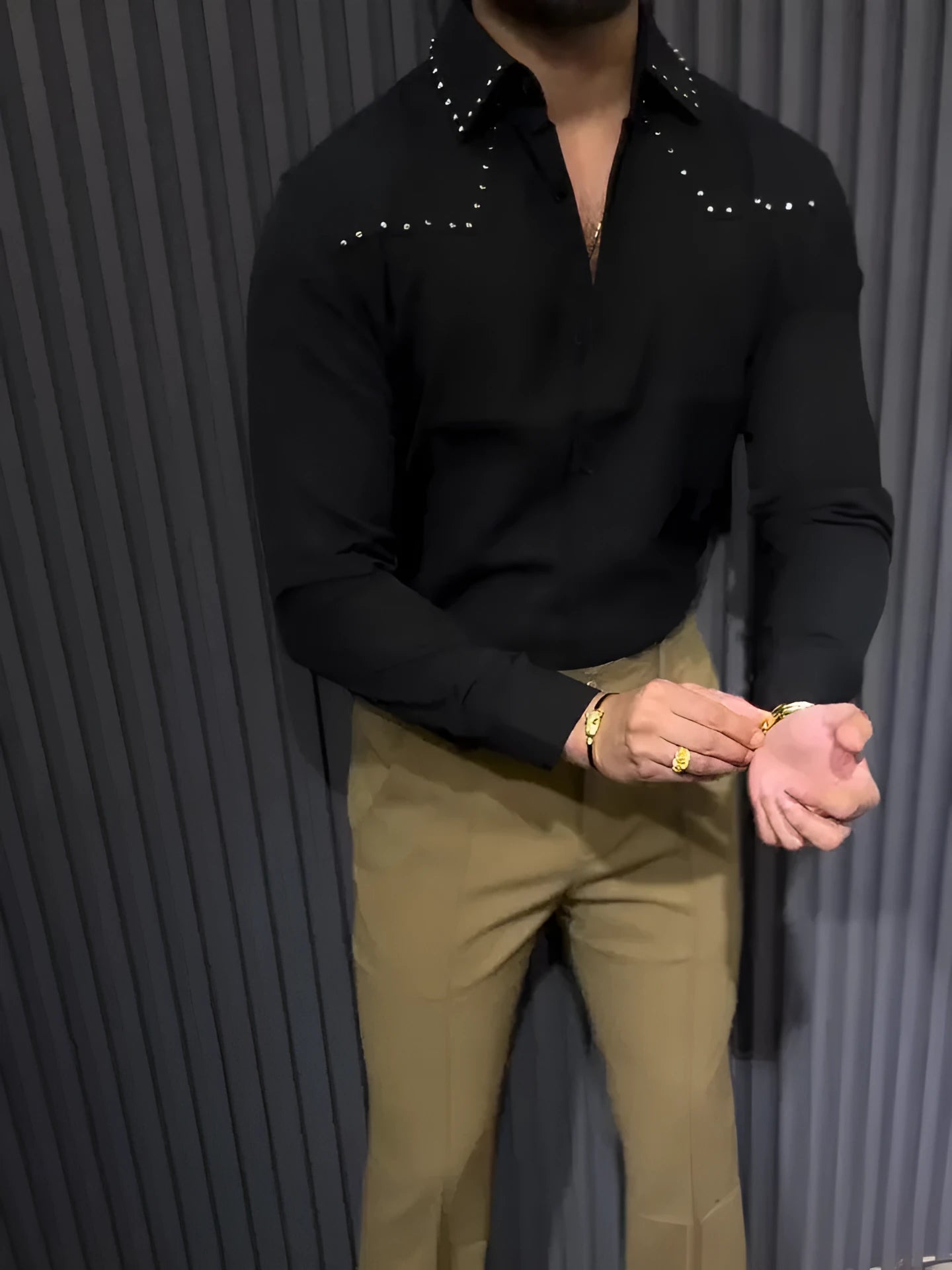 Black polyester button-down collar shirt with regular fit, front view, on plain background.