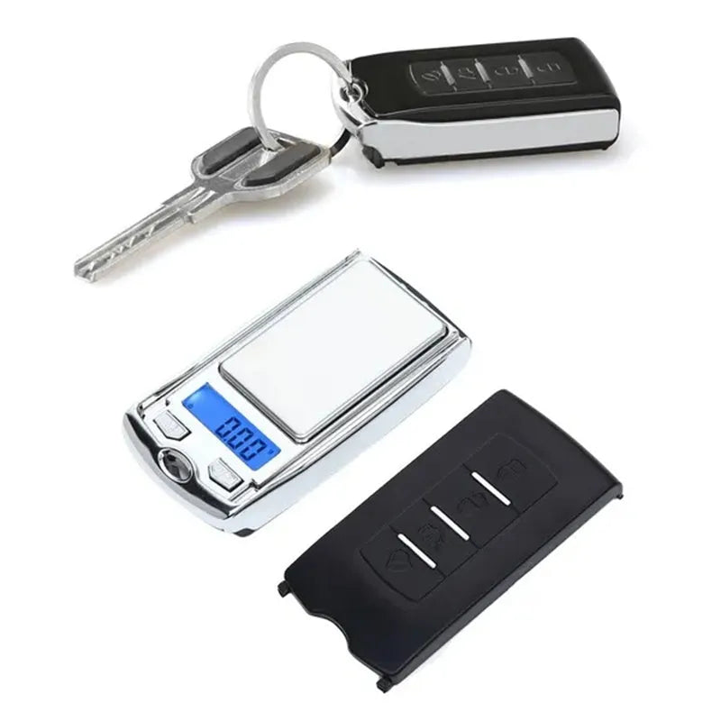 Portable mini digital pocket scale with LCD display, 100g capacity, 0.01g precision, compact grey casing