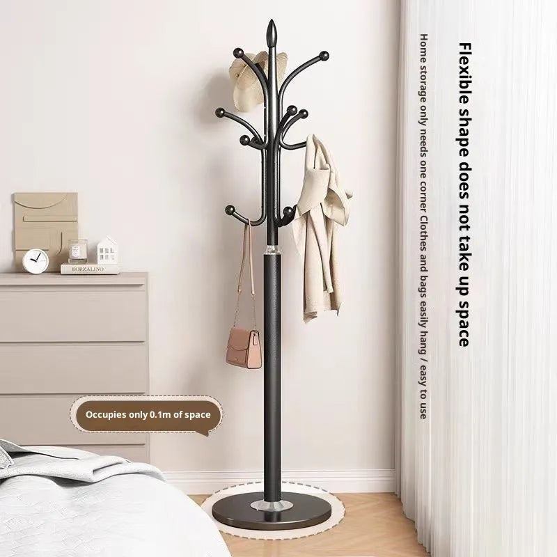 Floor-standing iron coat rack in black, vertical hanger for bedroom or hallway