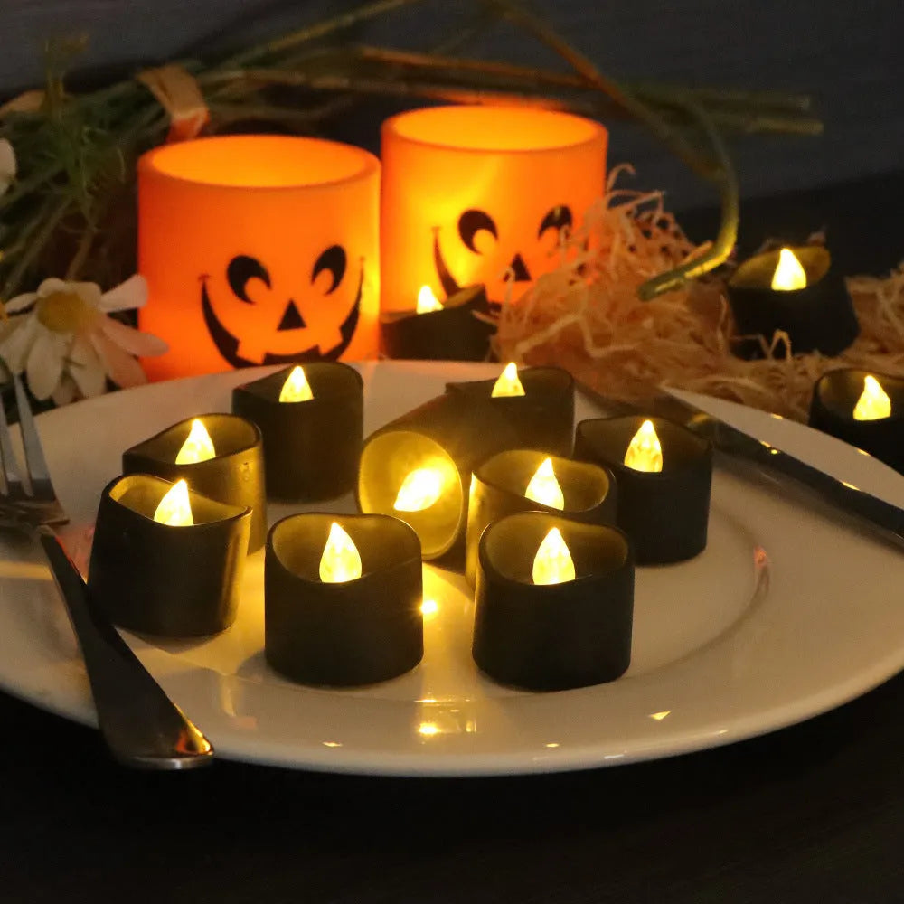 Set of 12 LED electronic wax candles with concave black plastic shells and yellow flash effect for Christmas decor