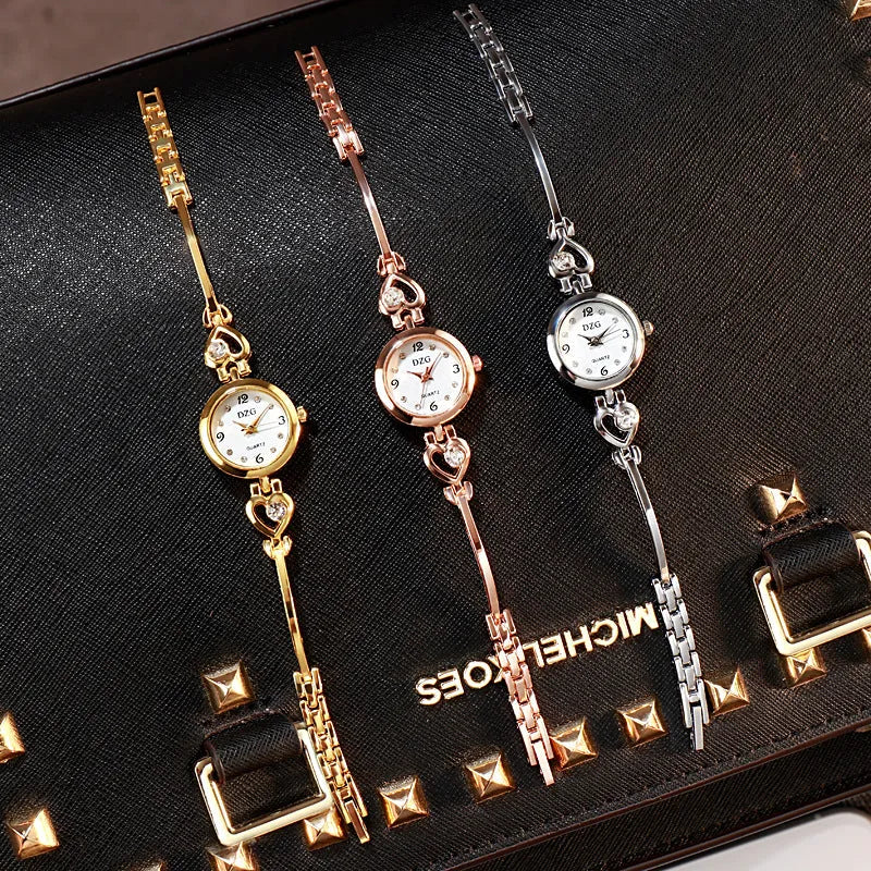 Women's simple rhinestone casual square watch with gold alloy strap and stainless steel buckle on white background