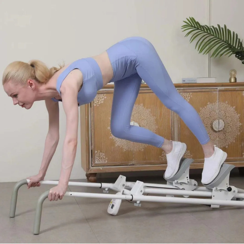 White folding treadmill with attached indoor climbing frame for home fitness.