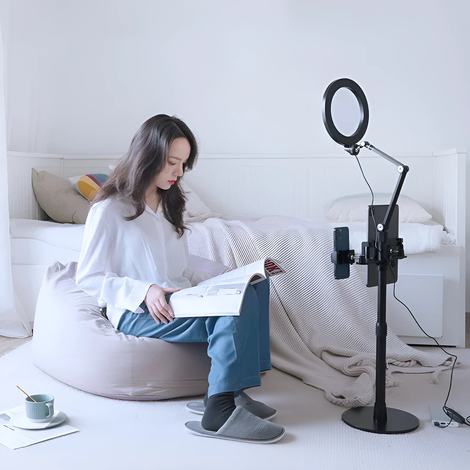Black floor-standing mobile phone tablet stand with fill light and folding rotation mechanism