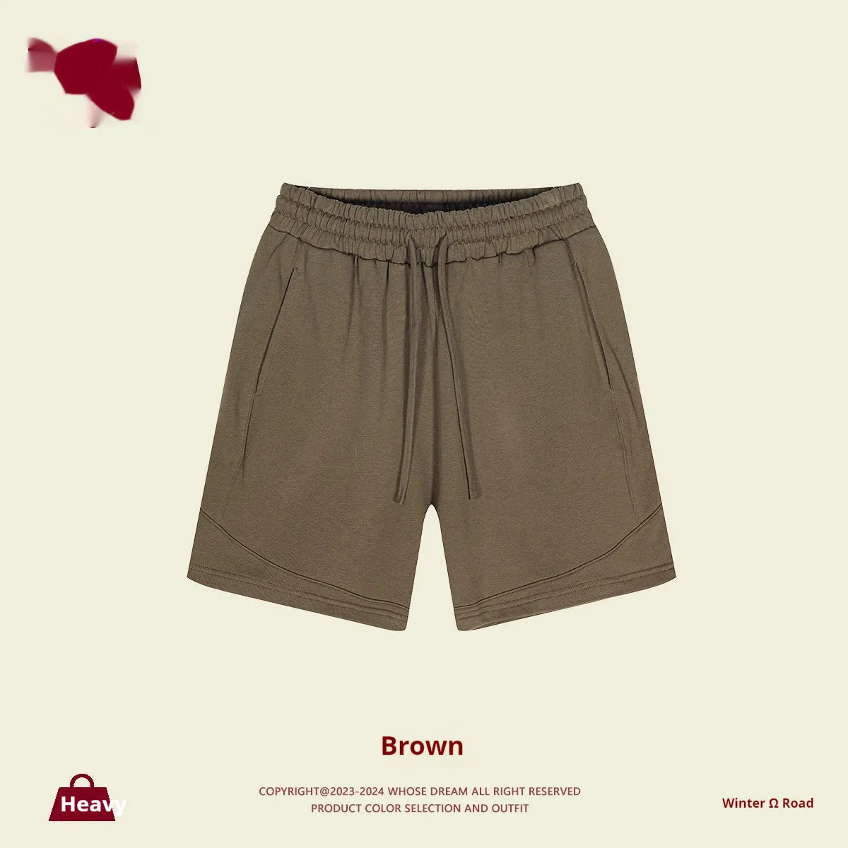 Solid colour cotton children's sports shorts in loose fit design available in multiple sizes