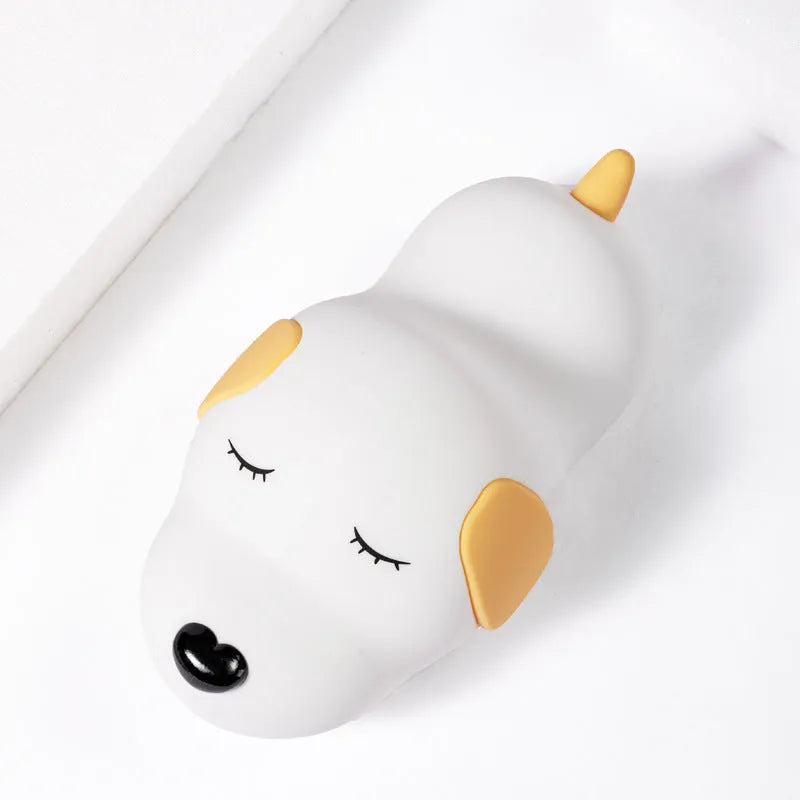 Silicone cartoon dog night light with two-tone design, shown with USB charging cable.