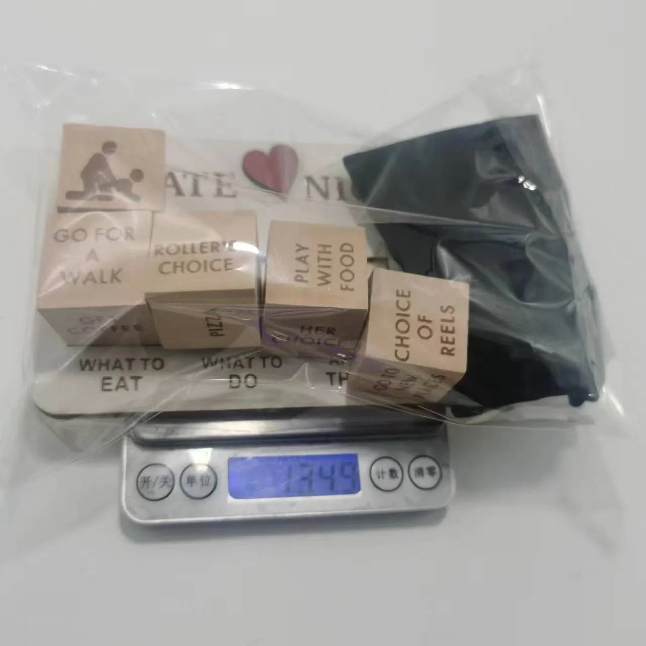Wooden date night dice game set with five natural wood dice and planner board for couples