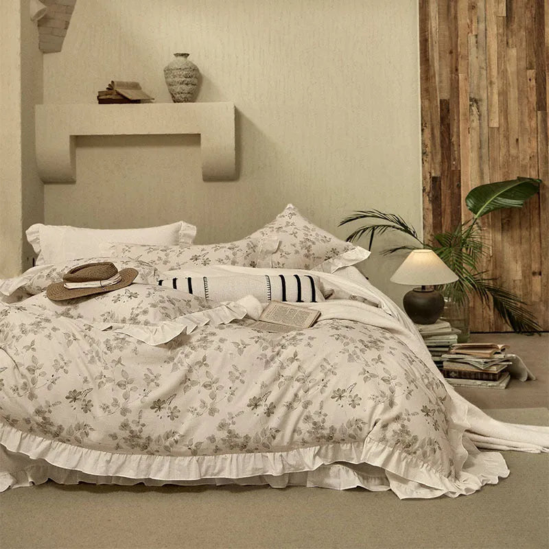 Cotton linen yarn-dyed printed four-piece bedding set in Raw Jute Colour with plants and flowers pattern on a bed