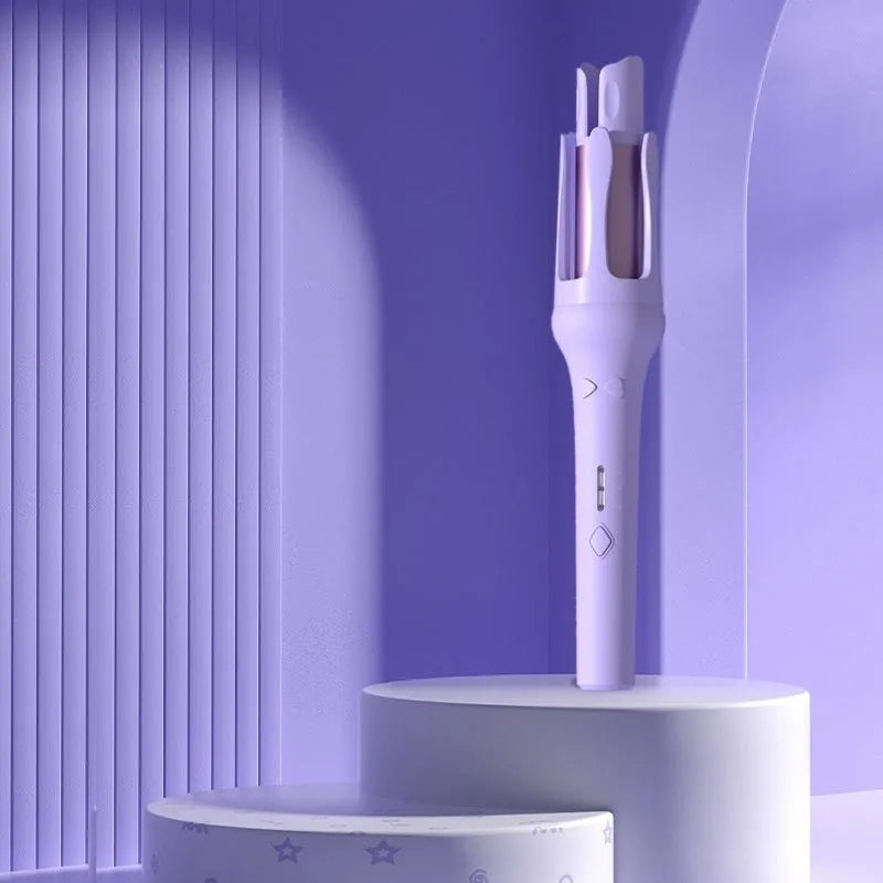 White and pink automatic hair curler with 32mm rotating barrel on a table