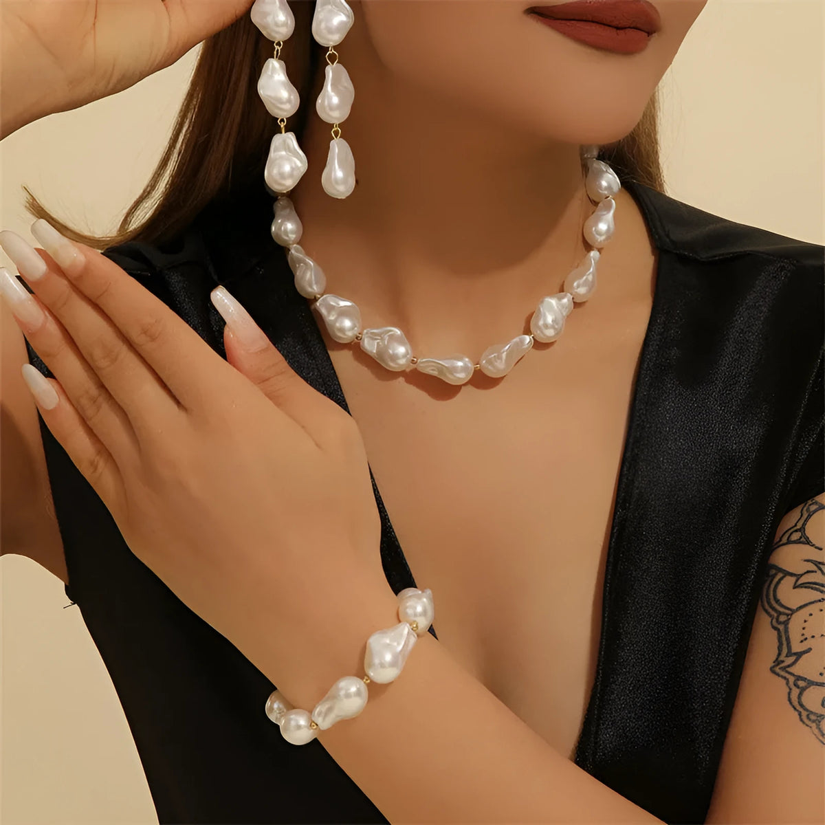 Baroque imitation pearl jewellery with irregular teardrop necklace, bracelet and earrings for women