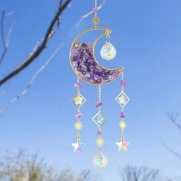 K9 crystal moon car pendant hanging on a metal chain, shown in a blue colour option.