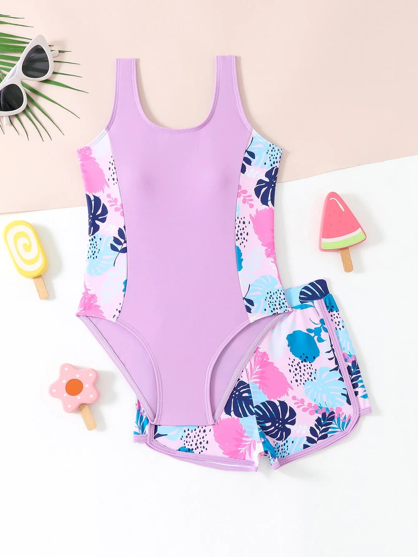 Girls two-piece swimsuit set with one-piece top and boxer shorts in purple, blue, and rose red
