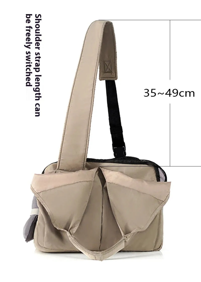 Apricot coloured cloth pet handbag carrier for cats or small dogs.