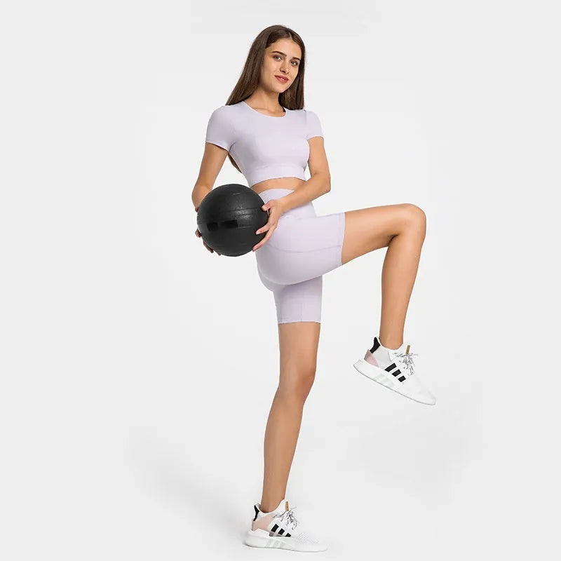 Women's cotton blend sports shorts in black with super stretch fabric and mid-length design