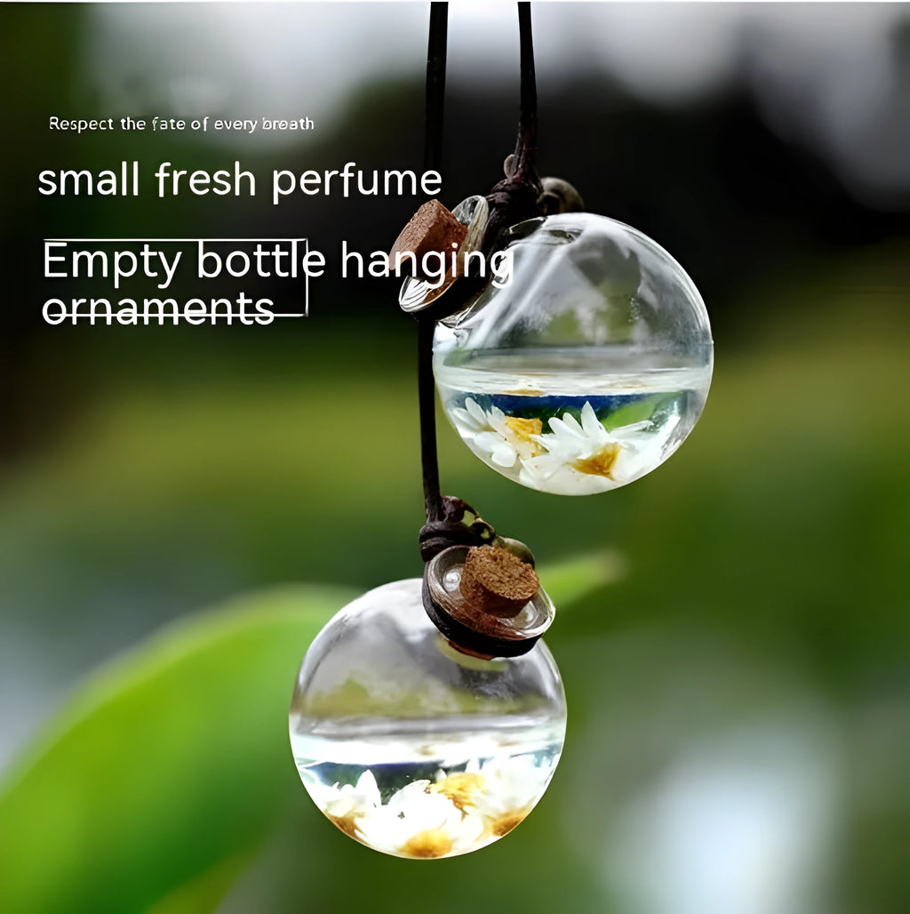 Glass car perfume pendant in fire extinguisher shape with light pink hydrangea preserved flower inside