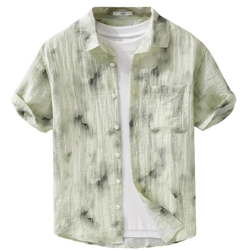 Linen blend printed short sleeve shirt cardigan in light green floral pattern, loose fit, on a female model