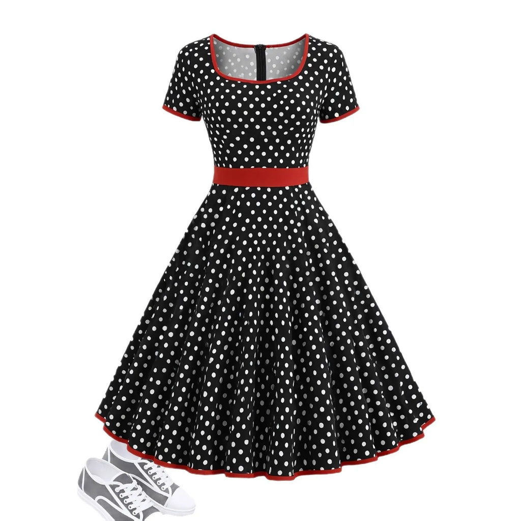 Multicolour polka dot pleated midi dress with a square collar and short sleeves on a hanger.