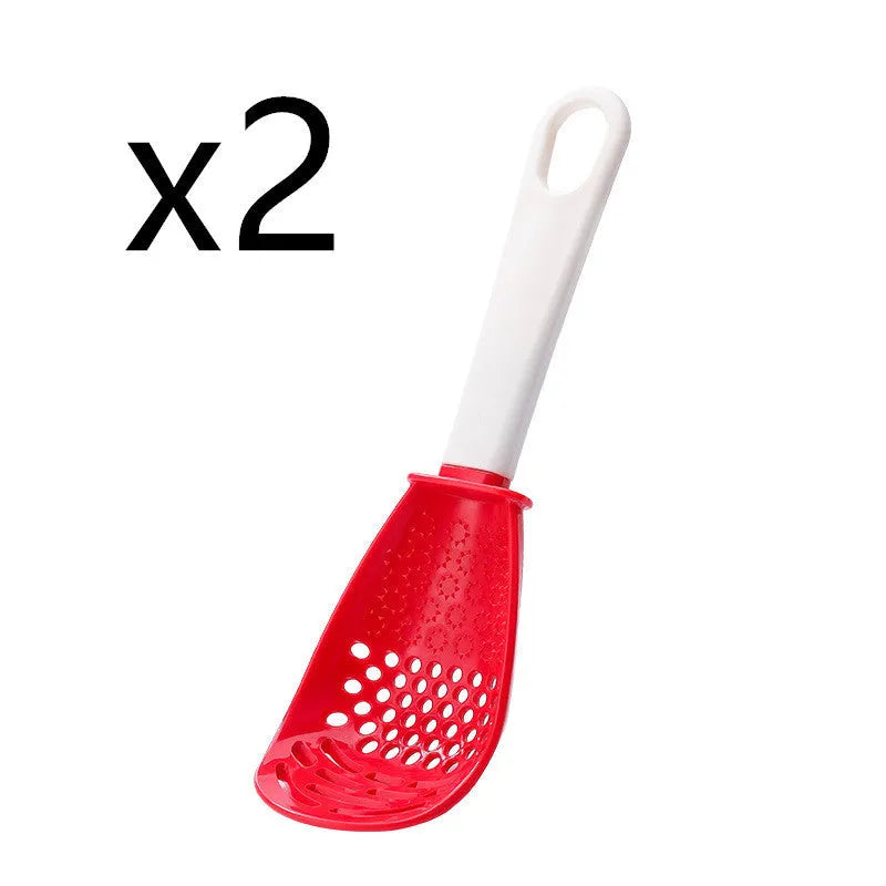 Red and black plastic multifunctional slotted cooking spoon with serrated edges for mashing and grinding.