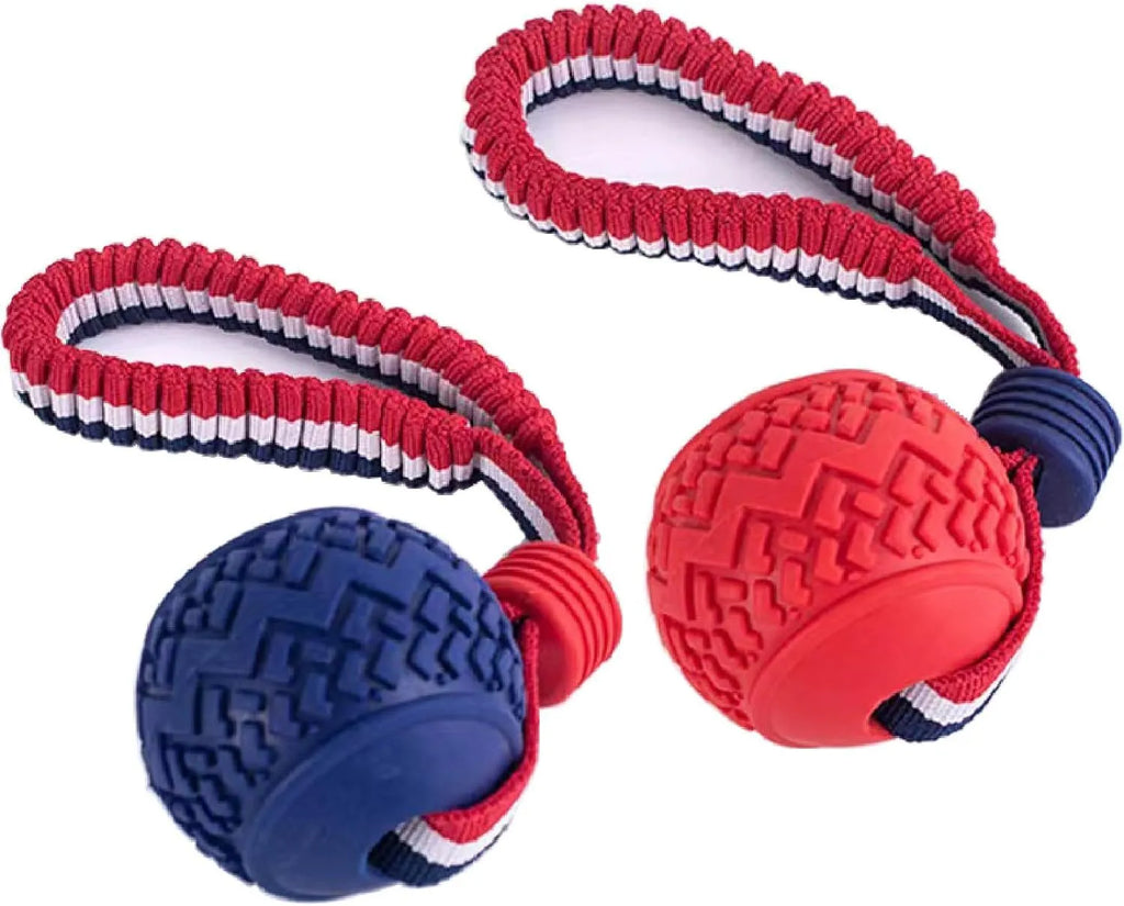 Blue and red natural rubber dog ball with attached rope for tug-of-war and teeth cleaning