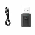 Black Bluetooth 5.0 audio transmitter receiver M135 with USB and aux cable on wooden desk