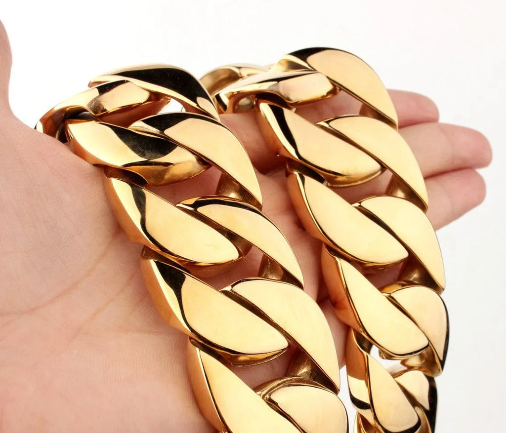 Men's gold titanium steel vacuum plating casting necklace with geometric design and whip chain on a white background