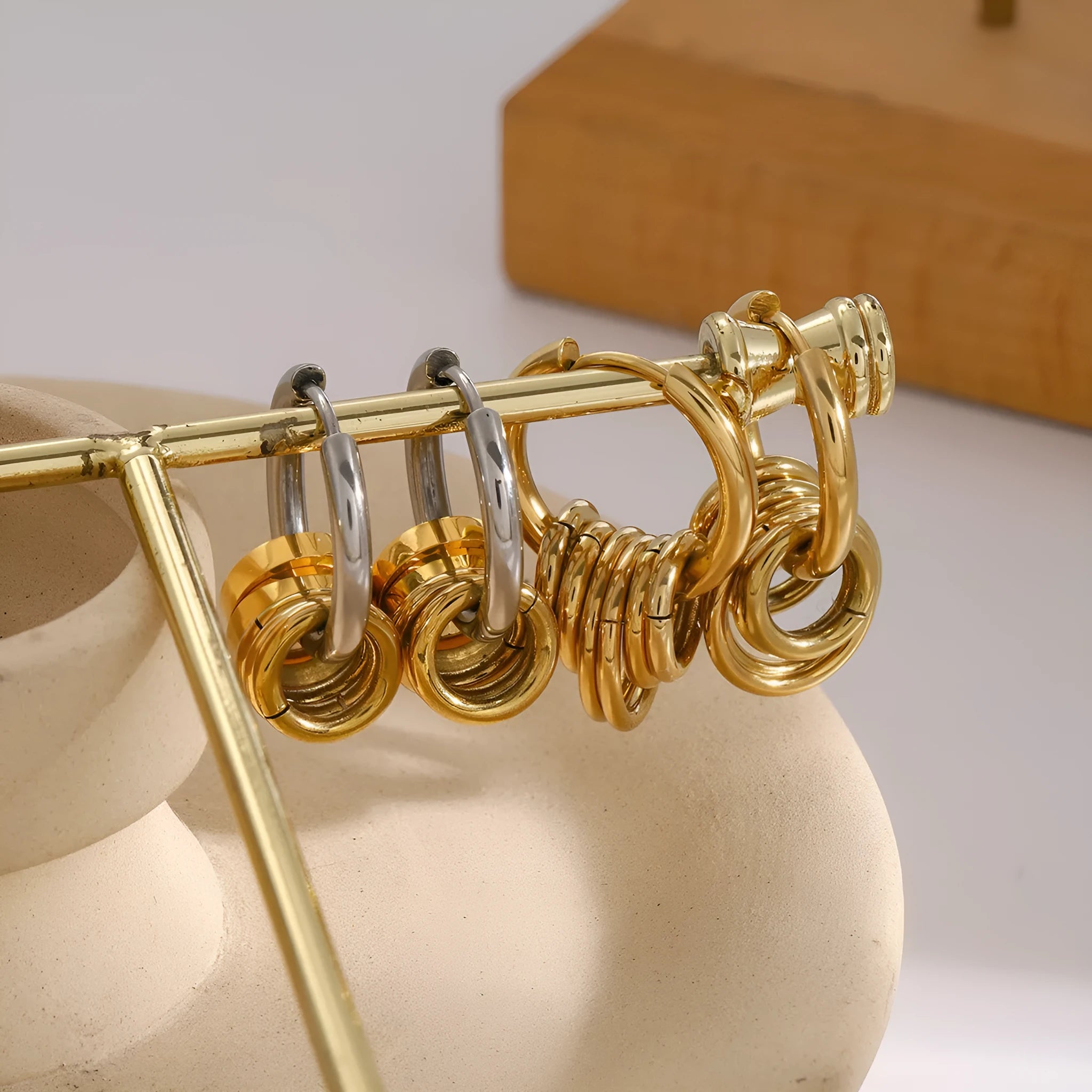 Pair of modern stainless steel earrings with electroplated colour finish in unisex ins style.