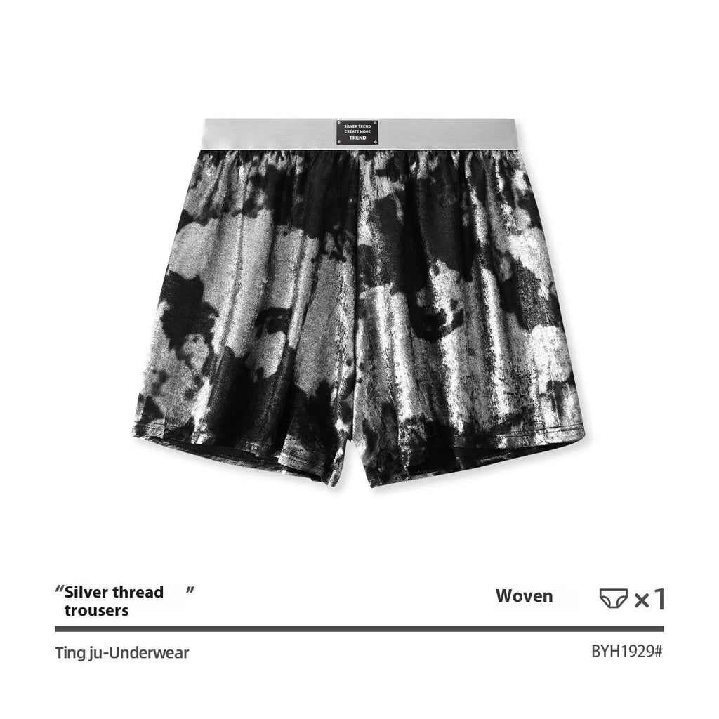 Men's reflective bright silver woven polyester sport underwear on a mid-rise waist.