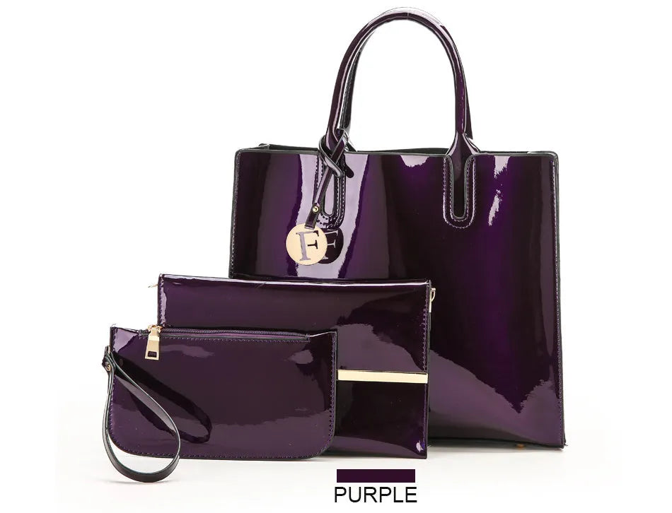 Three soft patent leather handbags in solid colours for women, shoulder and crossbody style with zipper closure