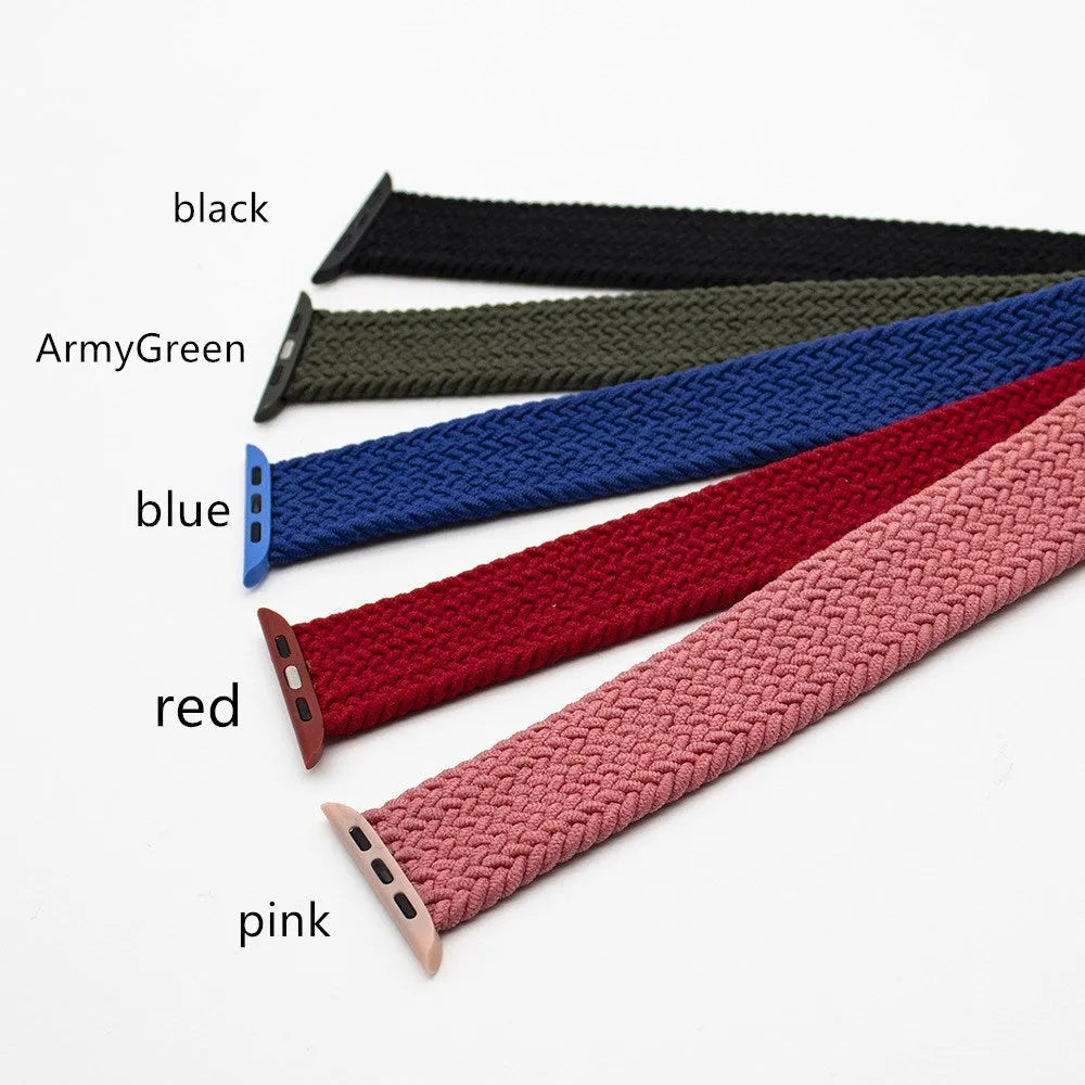 Elastic woven Apple Watch strap in recycled yarn, shown in red, fitting a smartwatch.