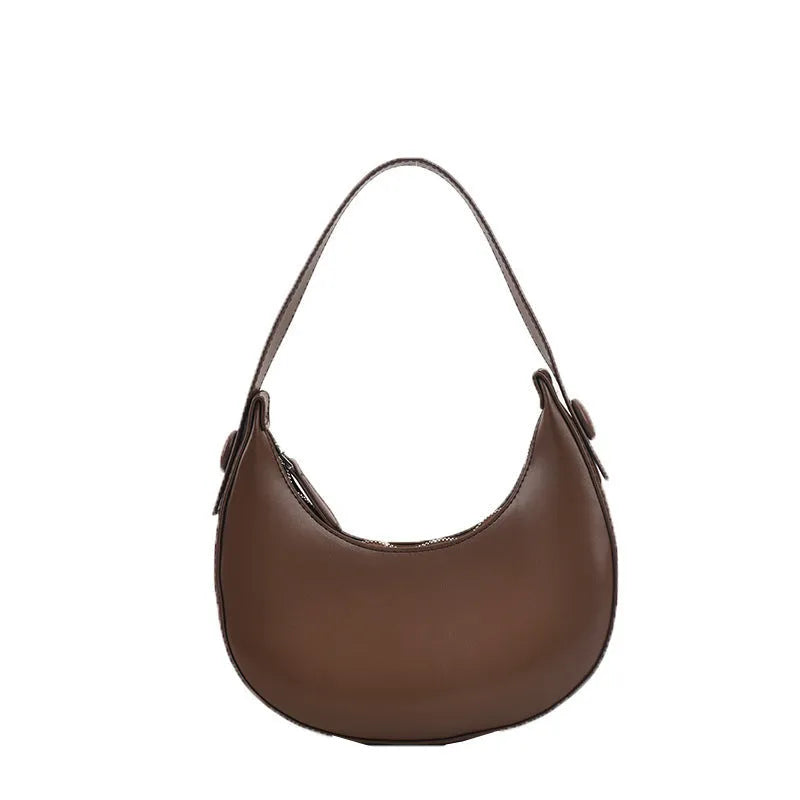 Women's retro-style PU leather shoulder bag in a dumpling shape, shown in black.