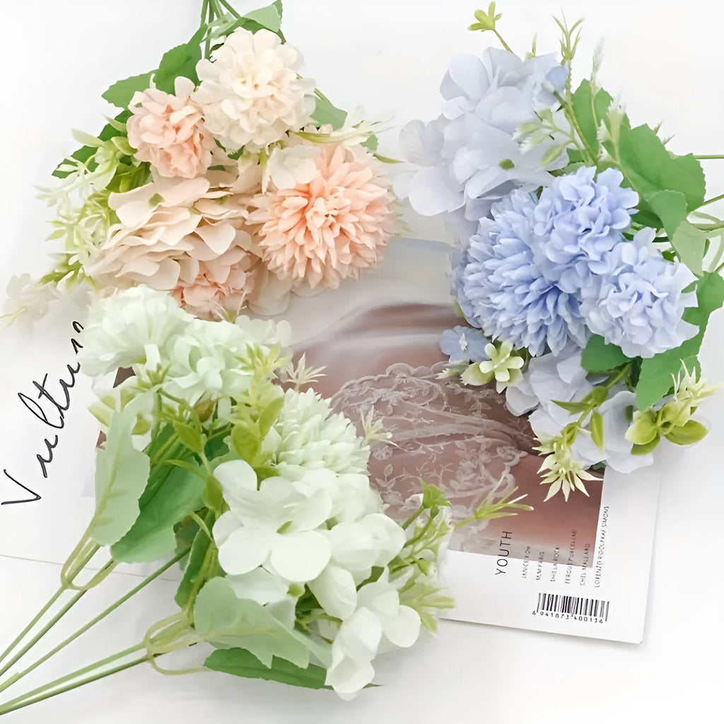 Artificial silk and plastic hydrangea flower combination in blue, white, and pink, with green plastic leaves, shown as a set of four stems