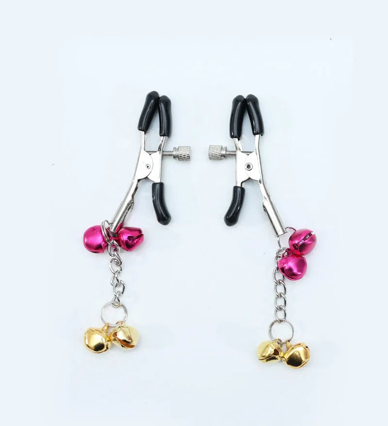 Red single bell nipple clamp pair with reel chain and two gold bells on white background