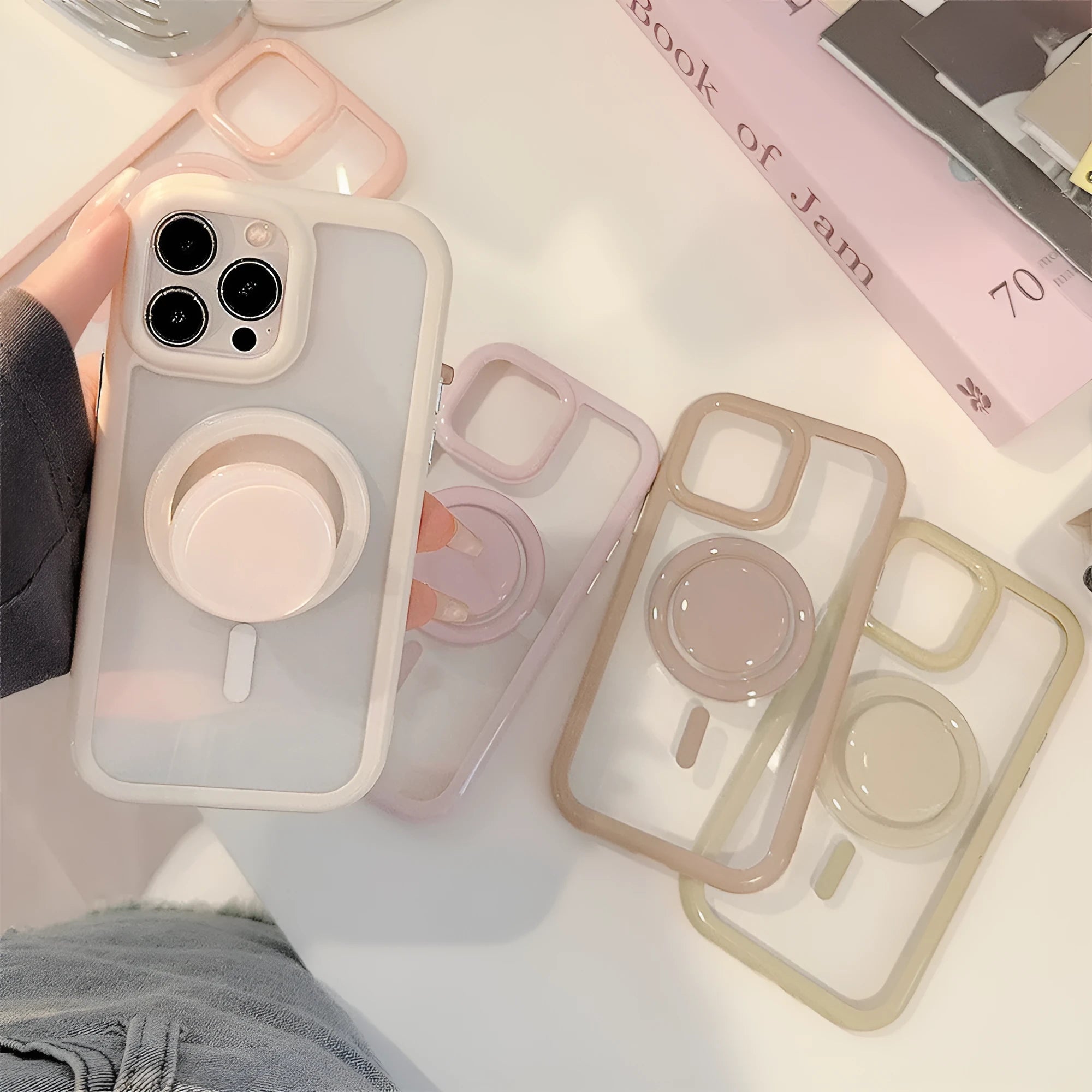 Simple Ins solid colour magnetic bracket phone case for iPhone 16 series in transparent acrylic with black magnetic bracket edge