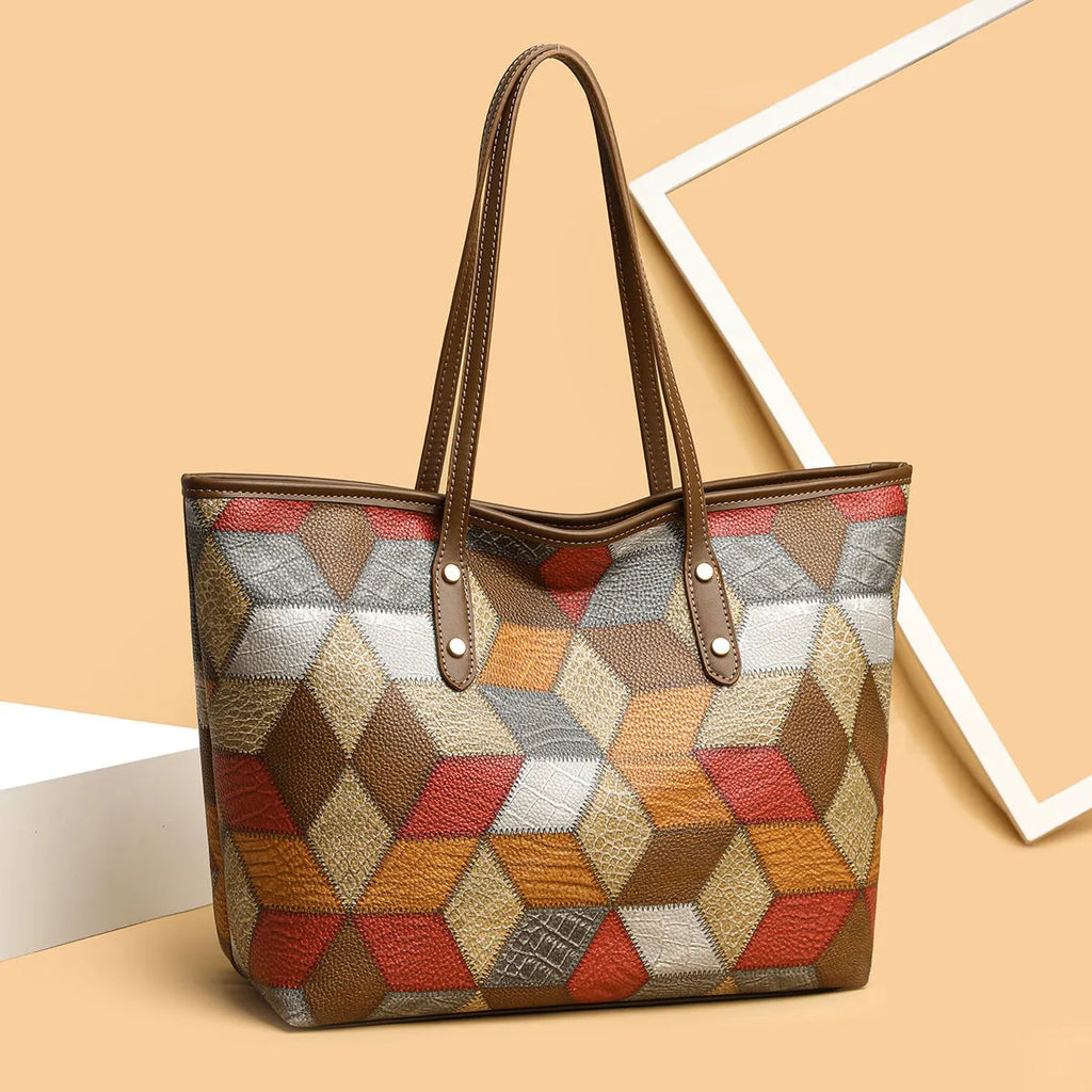 Women's blue brown PVC shoulder handbag with sandwich pocket design and large main compartment
