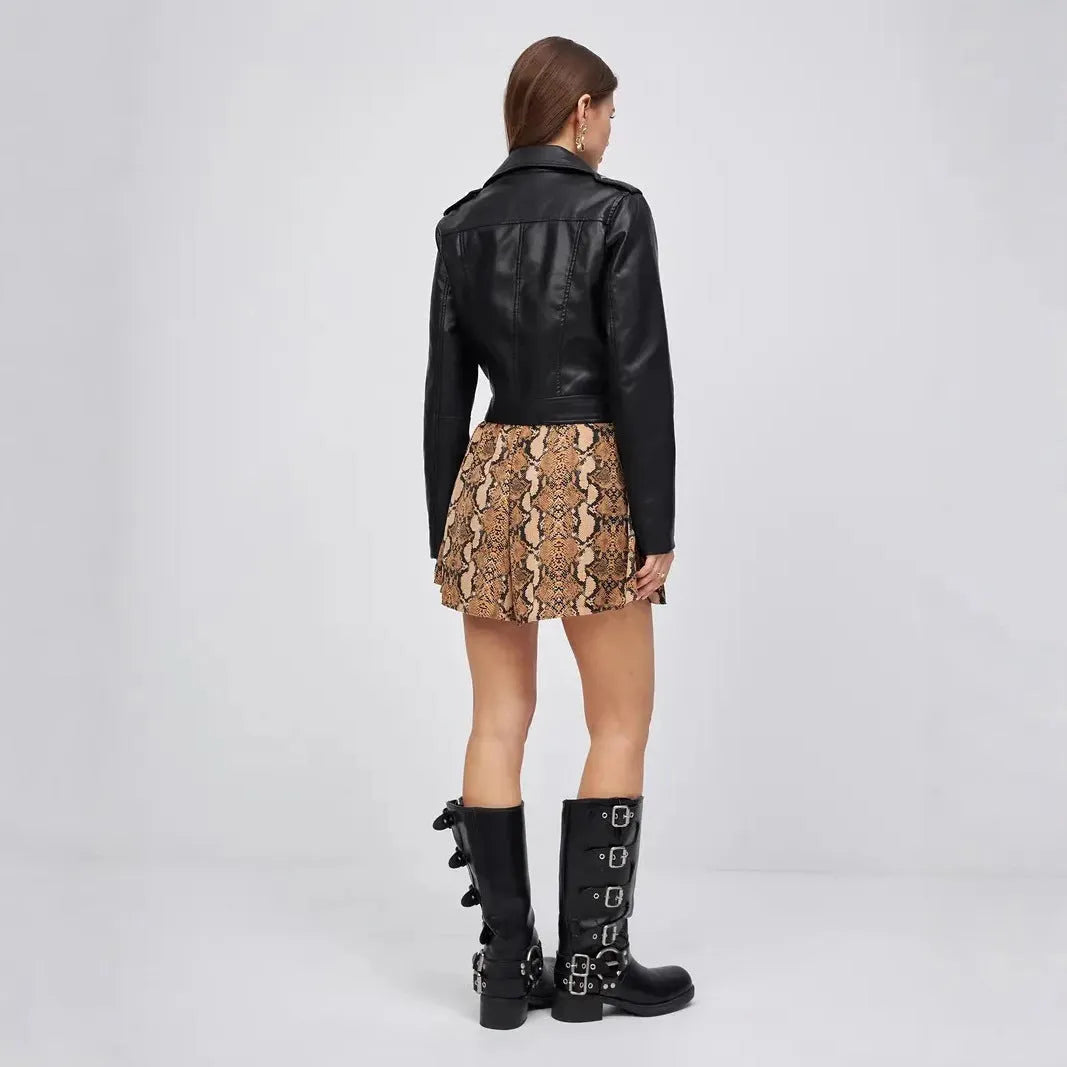 Women's black retro-style PU leather coat on a hanger, showing regular sleeves and hip length.