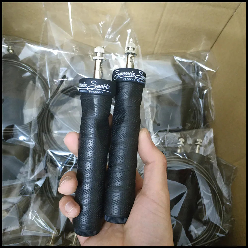 Jump rope for fitness with black PP handle, PU sweat band, and 3m PVC rope on gym floor