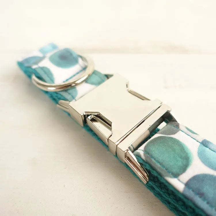 Blue bohemian polyester dog collar with adjustable sizing on a white background
