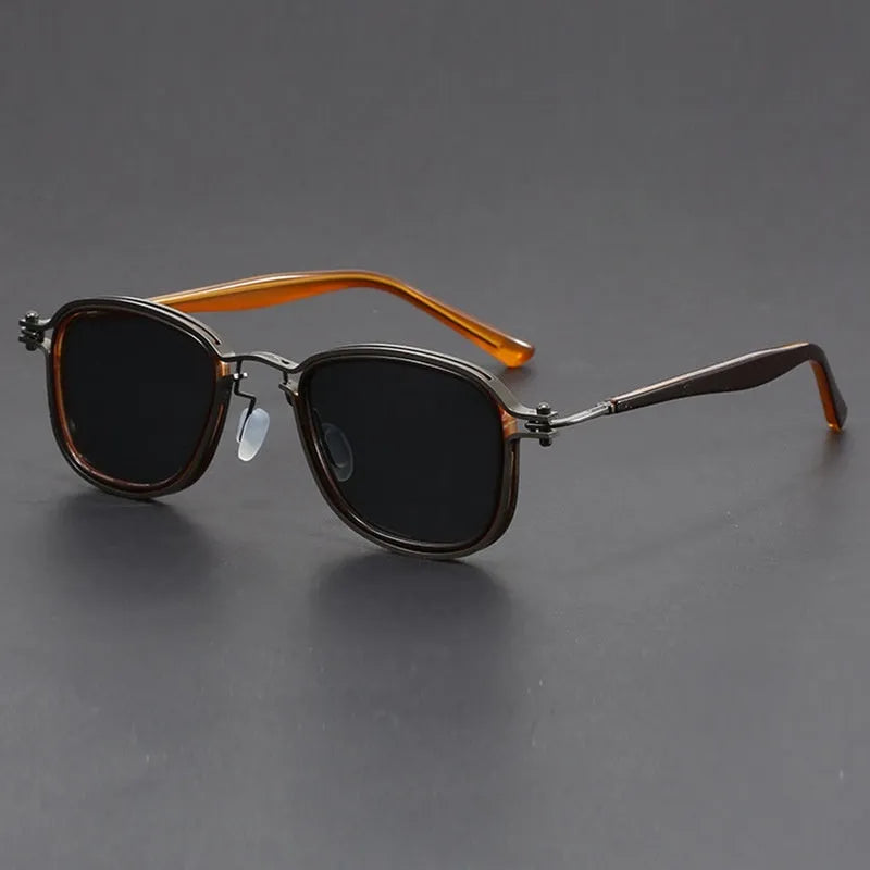 Retro square sunglasses with metal and plastic frame, shown in Hawksbill Tea colour with wave pattern on lenses.