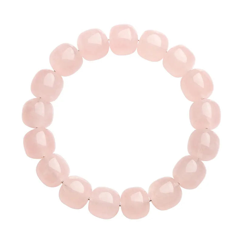 Pink crystal barrel bead bracelet on a black adjustable cord, showing geometric design.