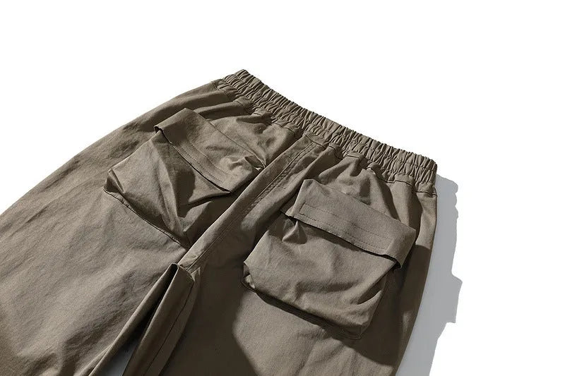 Men's cargo trousers in khaki or black, straight leg, mid-waist, drawstring ankle, cotton blend.