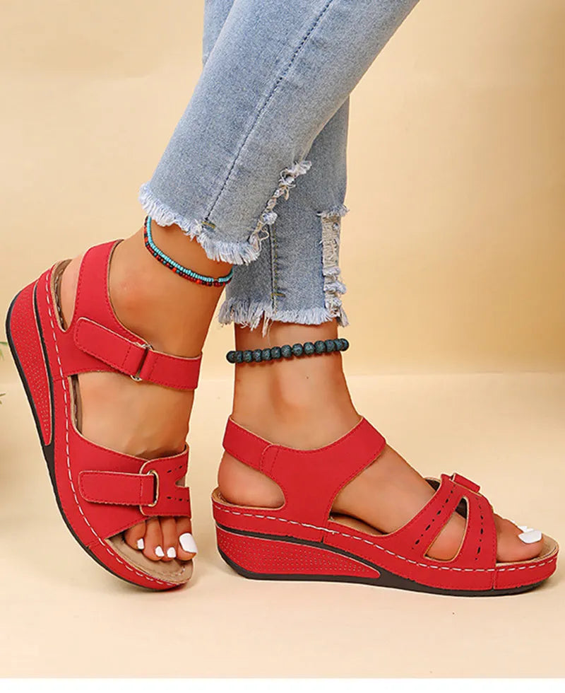 Women's wedge sandals with Velcro strap, platform rubber sole, fish mouth toe, available in red, black, brown and off-white.