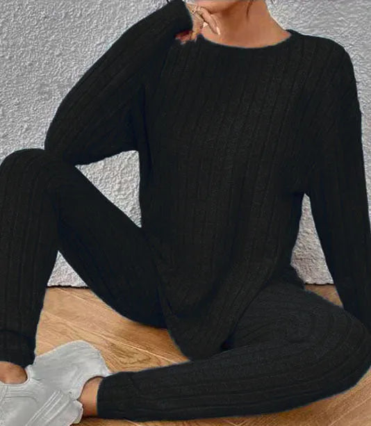 Black sunken stripe two-piece polyester homewear set with regular sleeves, showing top and pants.