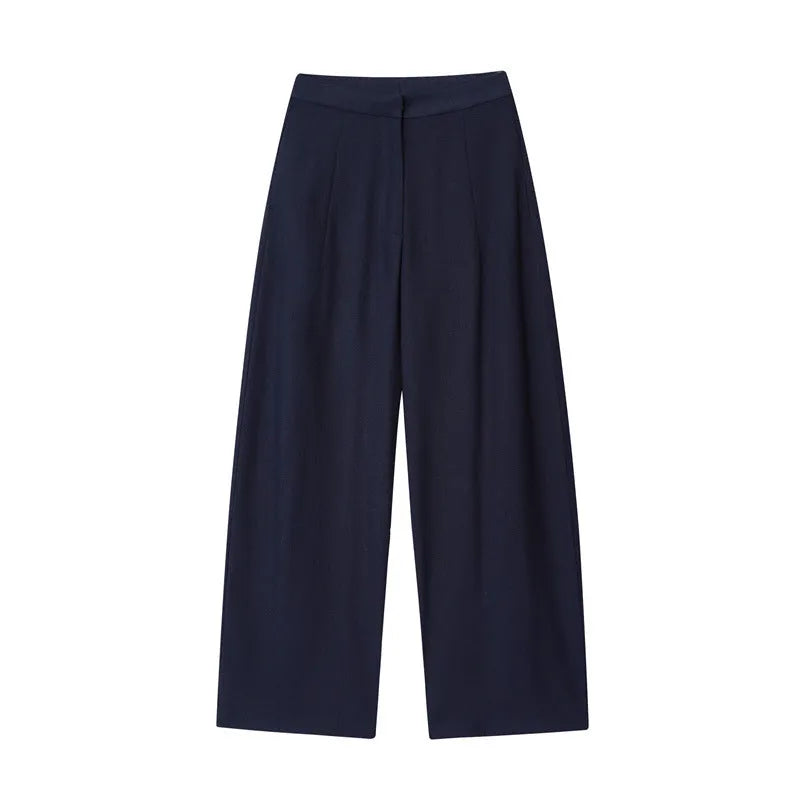 Women's linen blend wide-leg trouser and flounced sleeve top co-ord suit set in a professional style.