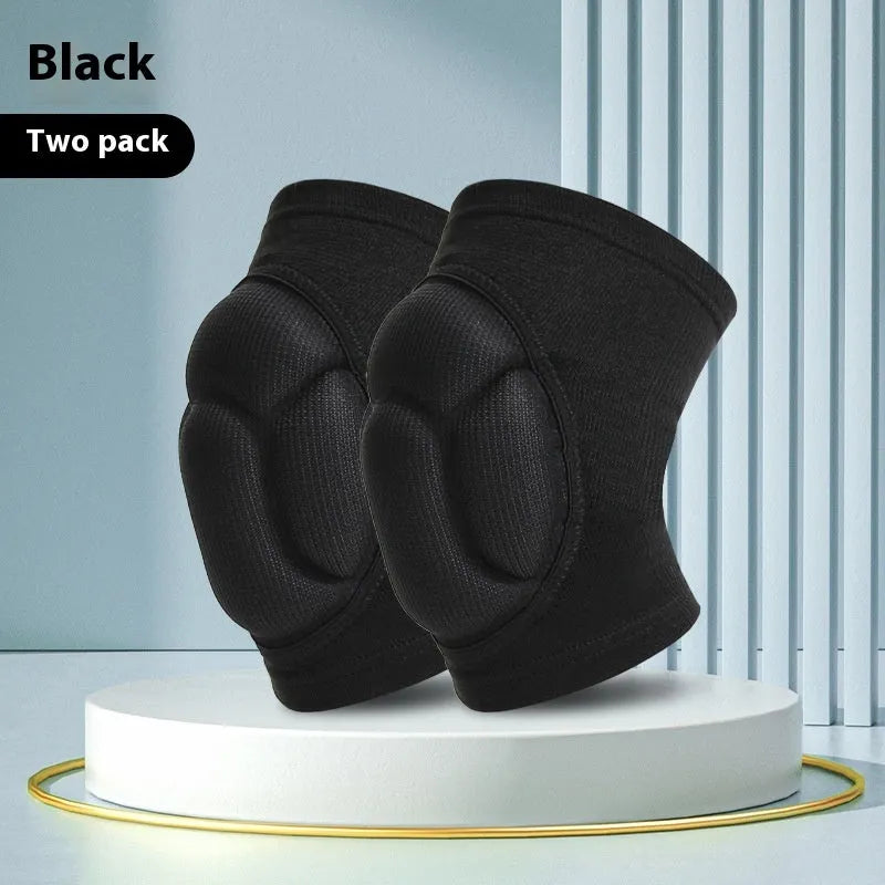 A pair of black breathable knee pads with thick sponge padding and adjustable straps for sports protection.