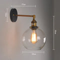 20cm round retro glass wall lamp with an aluminium holder in amber finish