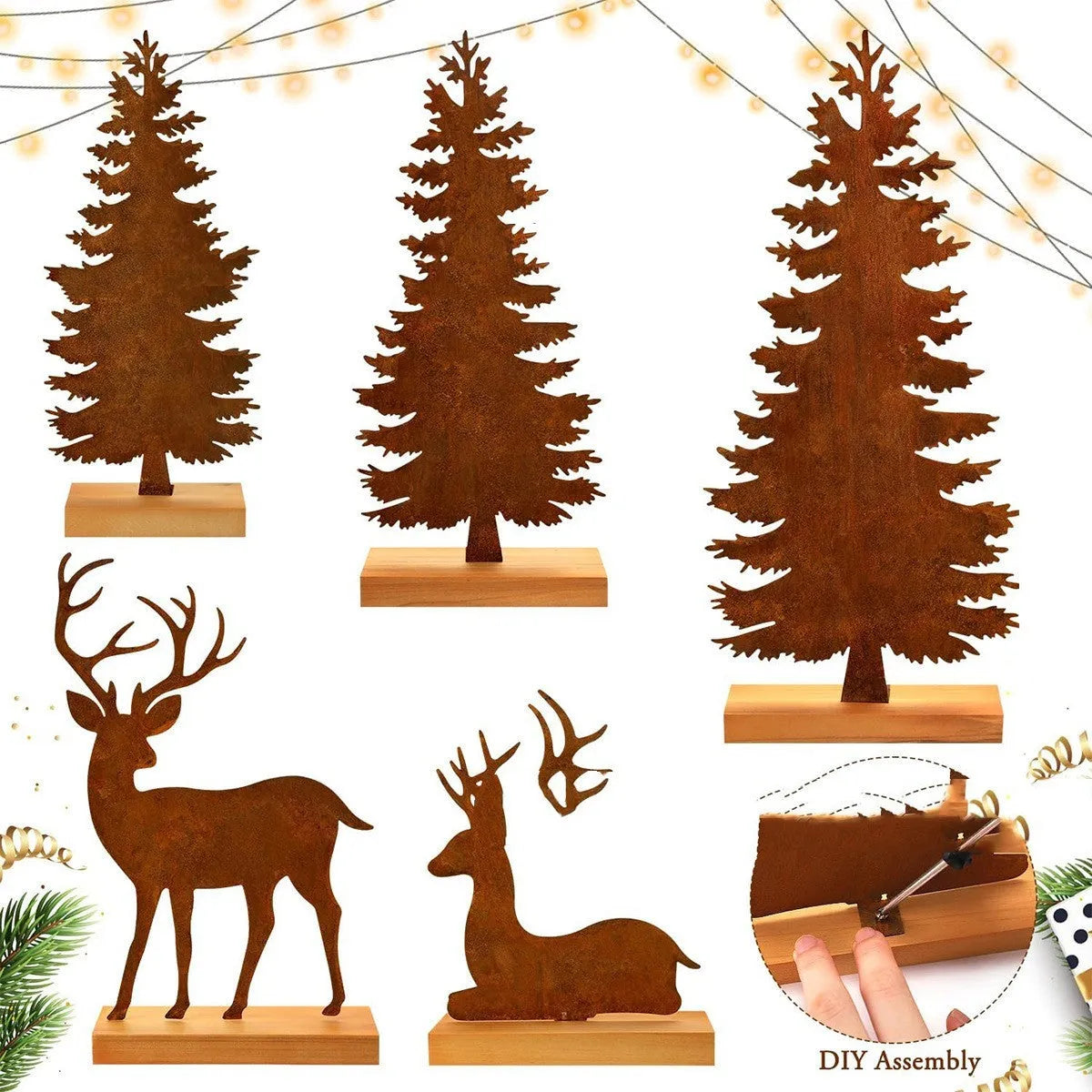 Set of three rustic iron metal Christmas tree and elk silhouette ornaments on a wooden surface.