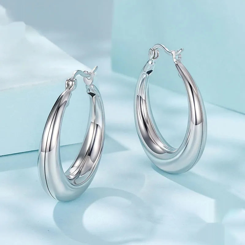 Copper ring clip earrings with silver electroplated needle in classic geometry design
