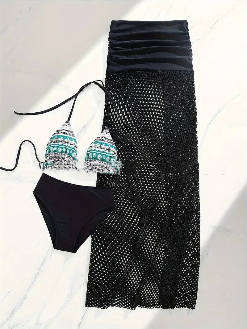 Women's three-piece bikini set with a fishnet long skirt in a gradient pattern.