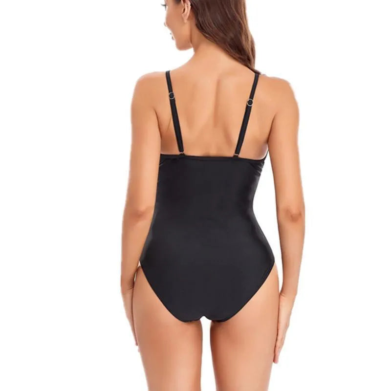 Ladies' solid black backless one-piece swimsuit made from high-elasticity spandex fabric.